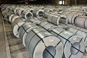 Selection table matching transformer types — distribution, power, UHV, dry-type, traction, PV — to recommended silicon steel grade, thickness, and example grade codes
