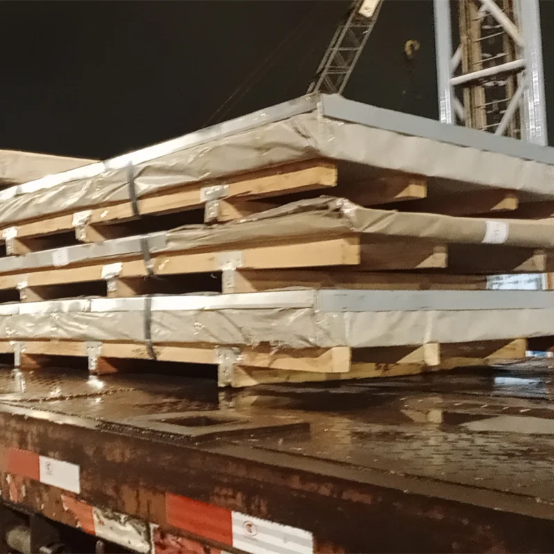 Electrical steel coil protected with wooden crate and outer wrapping for export shipment