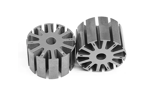 Stamped rotor and stator laminations for an EV traction motor