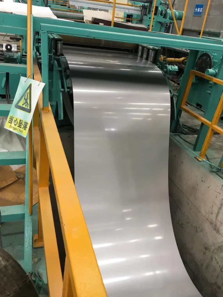 Ultra-thin CRNGO electrical steel strip during production on rolling line for EV traction motor applications
