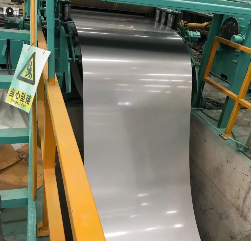 Ultra-thin CRNGO electrical steel strip during production on rolling line for EV traction motor applications