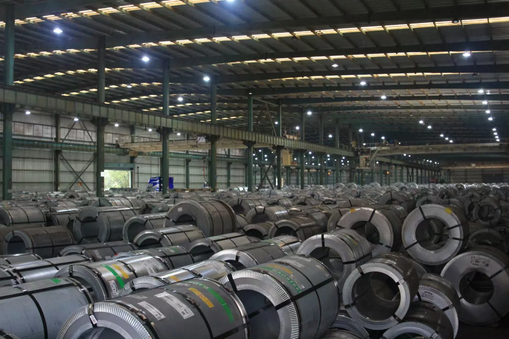 Electrical steel coils stored in warehouse for GB JIS EN AISI grade comparison