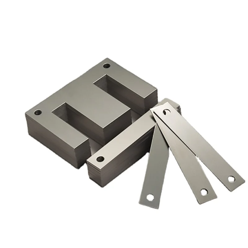 Stacked E-type and I-type electrical steel laminations showing sheet thickness