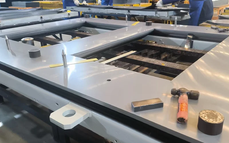 Stamped and stacked CRGO laminations for a distribution transformer core