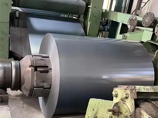 M6 CRGO steel coil loaded on the decoiler of a processing line
