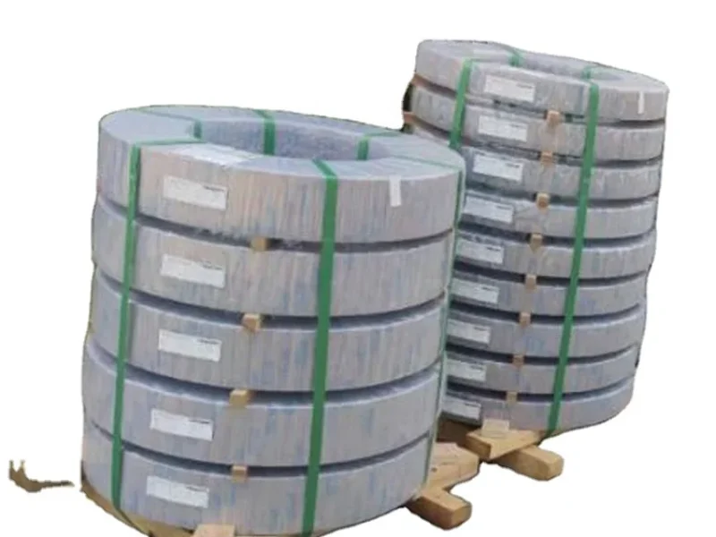 Coils of cold rolled grain oriented steel stored in a steel manufacturing plant