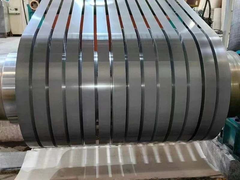 Rolls of cold rolled grain oriented steel stored in a production facility